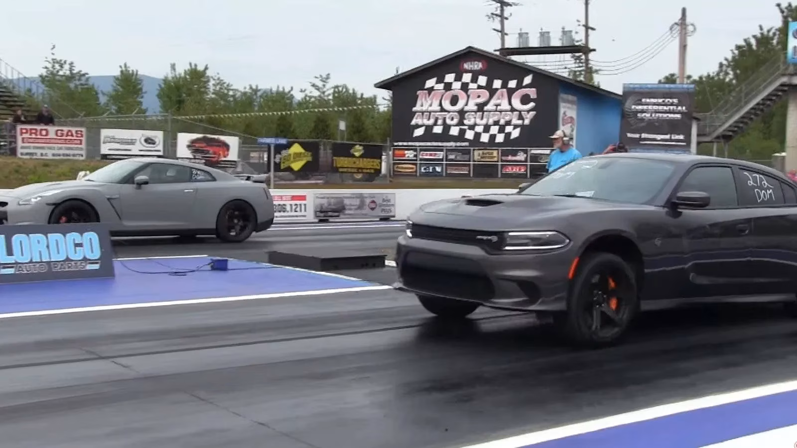 muscle-vs-precision-hellcat-and-gt-rs-photo-finish-leaves-everyone-guessing-image-0